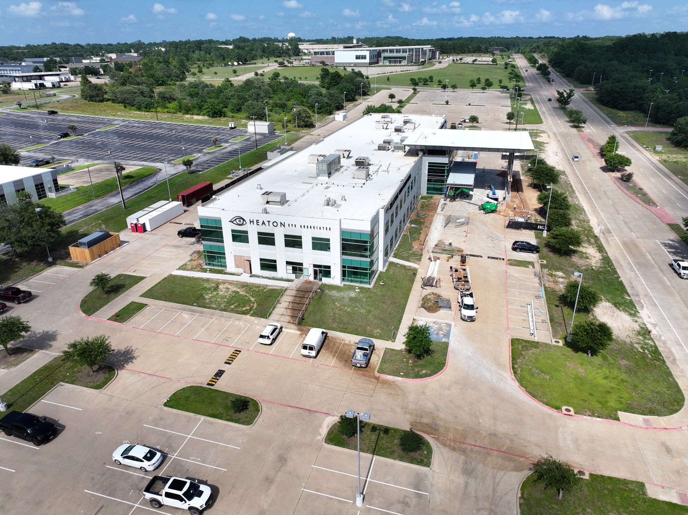 Aerial of a three-story medical office building with new entry canopy